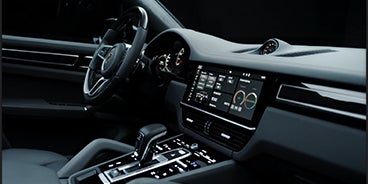 Couple Driving Porsche Cayenne in Houston TX